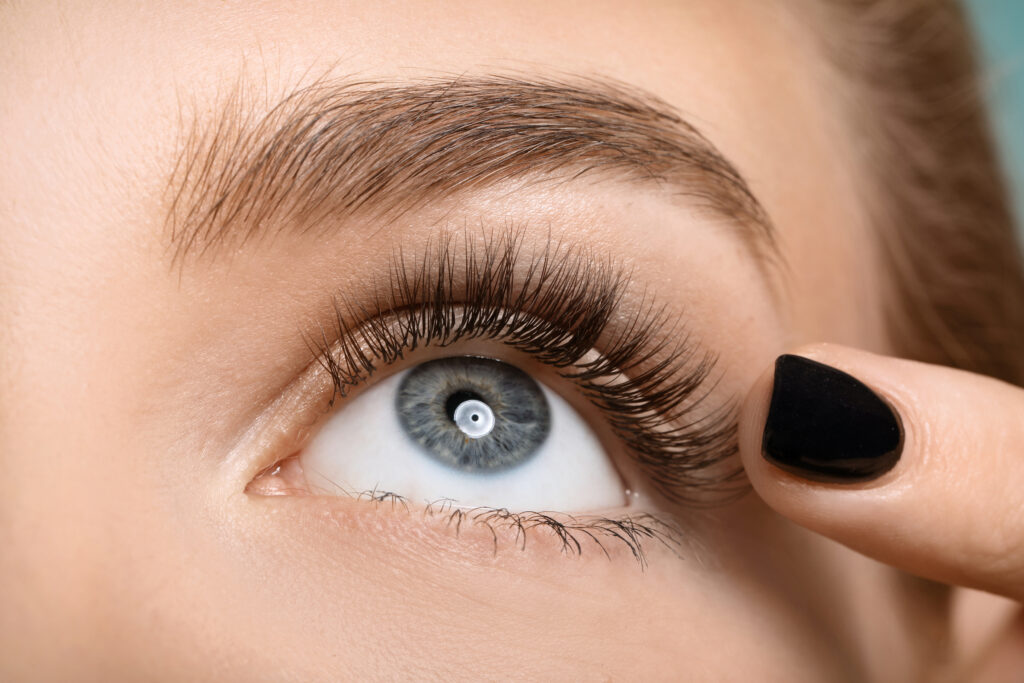 Beautiful female eye with long eyelashes, closeup