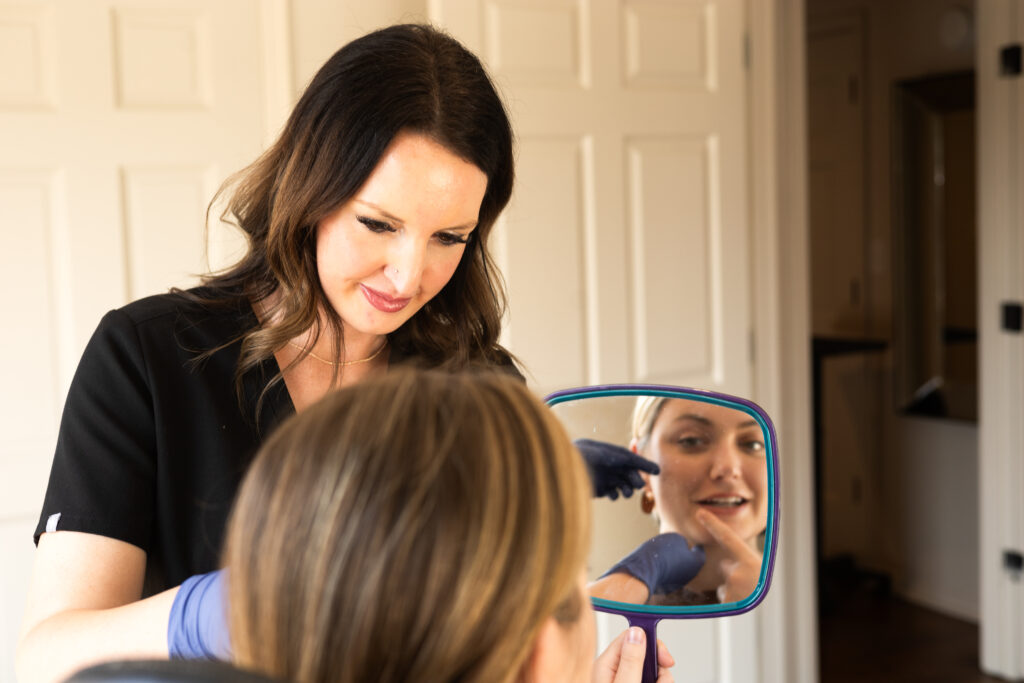 Nurse and patient discussing details about her face