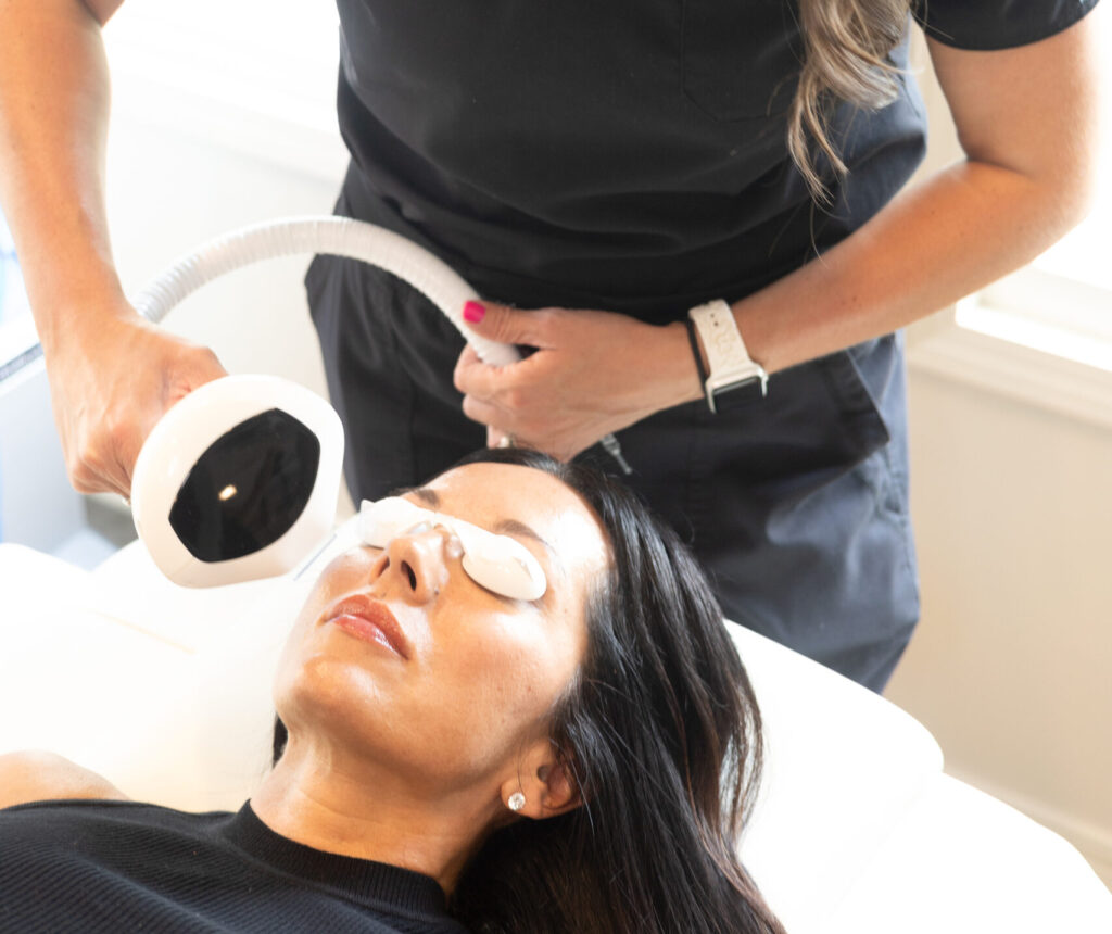 Woman getting a face treatment