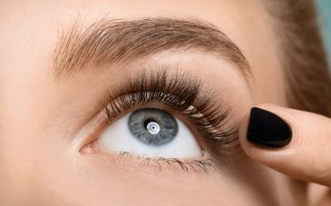 Beautiful female eye with long eyelashes, closeup